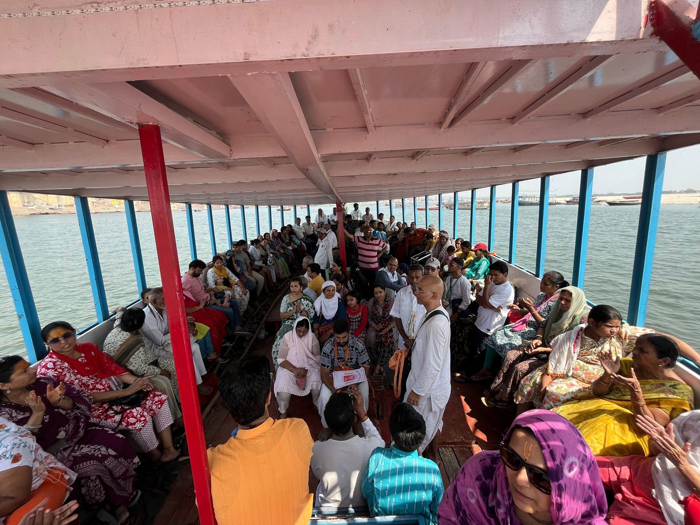 Evolve Pune pilgrims on a boat during a yatra